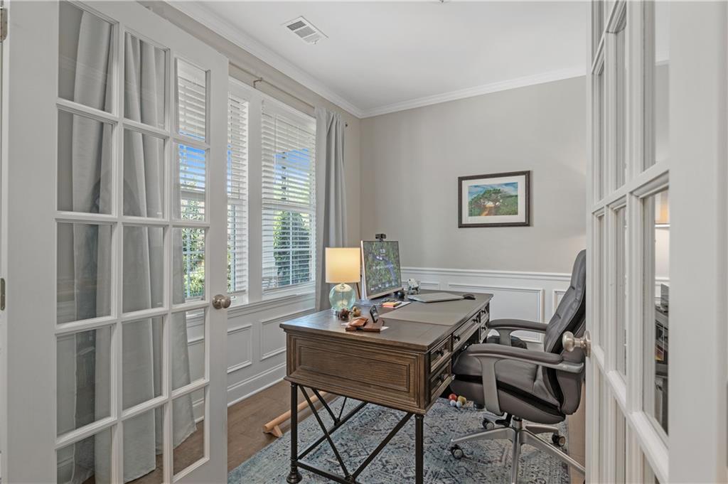 39 Floating Leaf Way Dallas, GA 30132 - Photo 7 of 40 a view of a workspace with furniture and a window