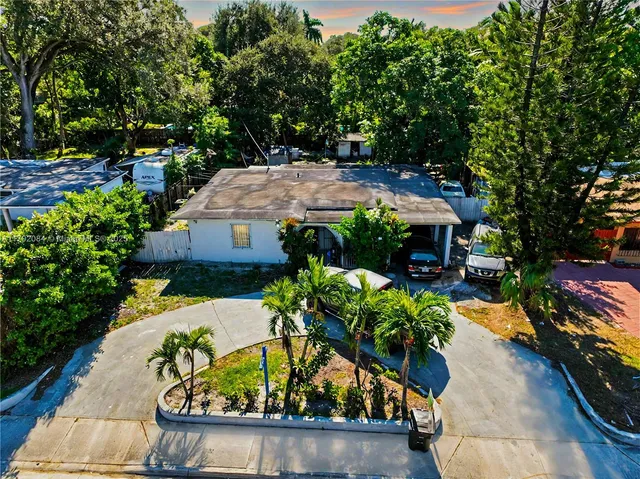 a view of a garden with patio