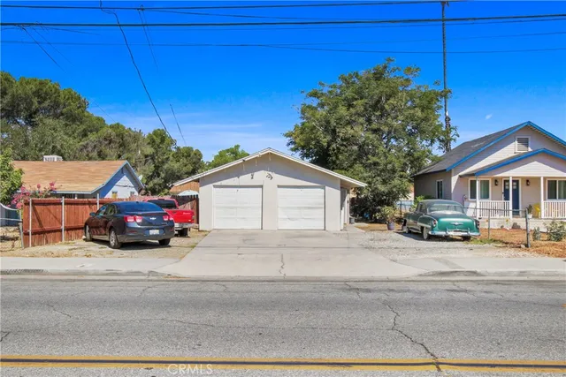 a car parked in front of a house