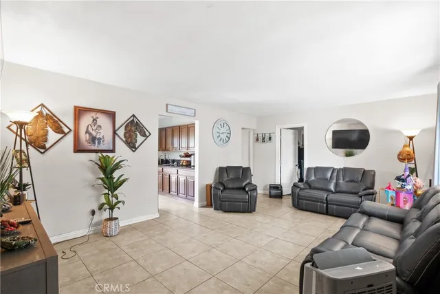 a living room with furniture and a couch