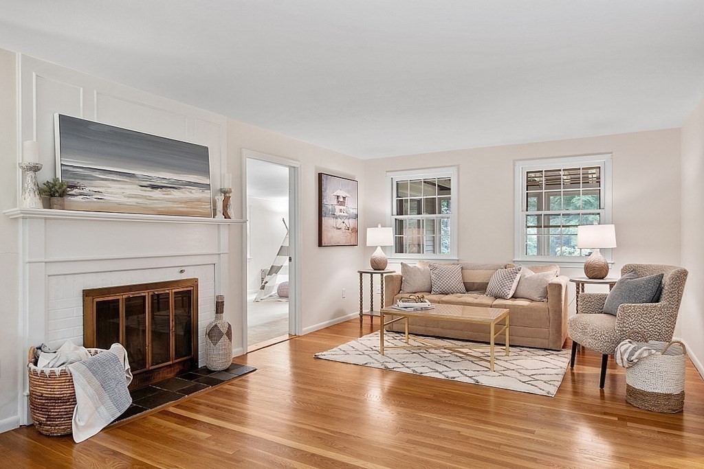 100 Chester Road Boxborough, MA 01719 - Photo 15 of 40 a living room with furniture and a fireplace