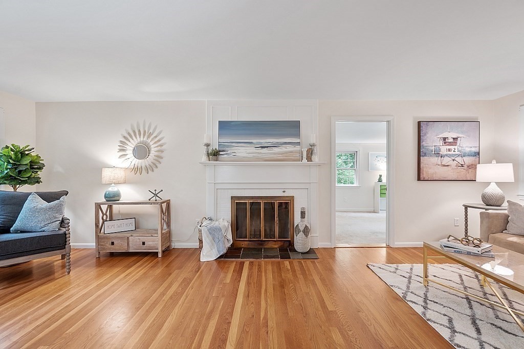 100 Chester Road Boxborough, MA 01719 - Photo 16 of 40 a living room with furniture and a fireplace
