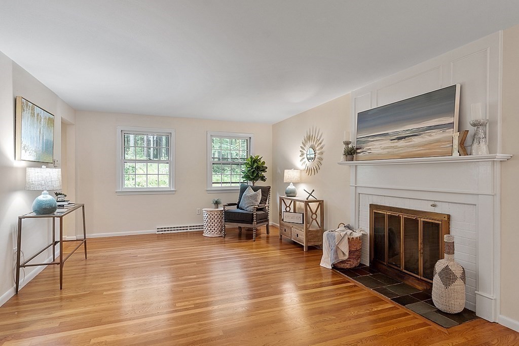 100 Chester Road Boxborough, MA 01719 - Photo 17 of 40 a living room with furniture and a fireplace