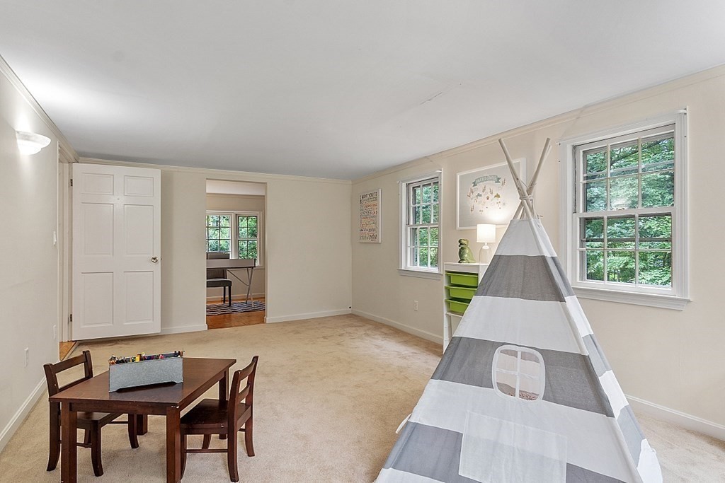 100 Chester Road Boxborough, MA 01719 - Photo 23 of 40 a living room with furniture and a window