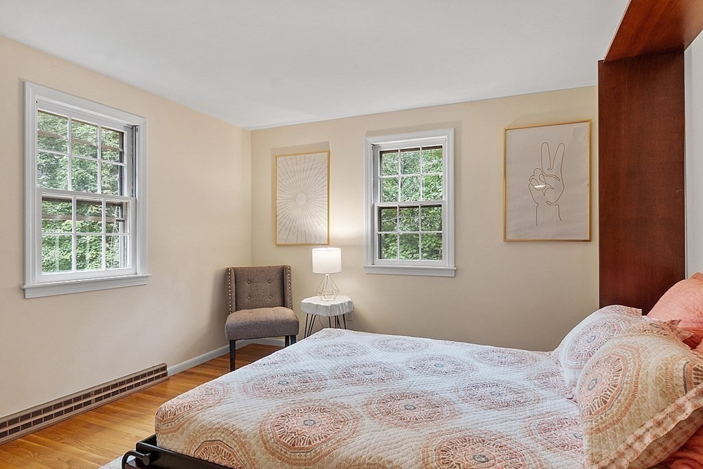 100 Chester Road Boxborough, MA 01719 - Photo 30 of 40 a bedroom with a bed and a window