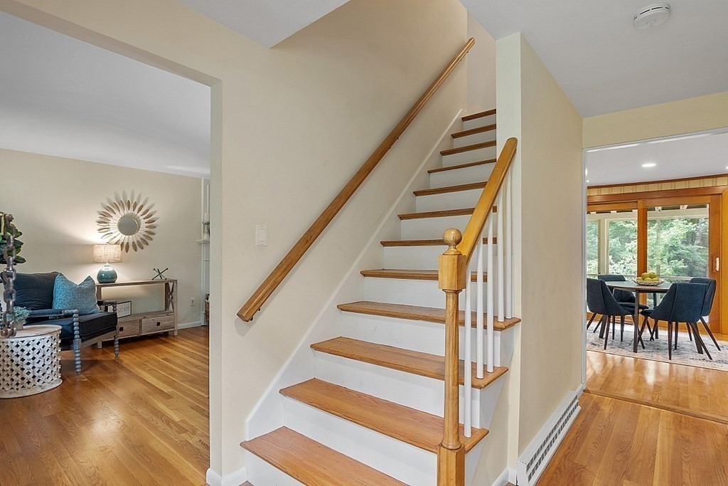 100 Chester Road Boxborough, MA 01719 - Photo 7 of 40 a view of entryway and hall with wooden floor