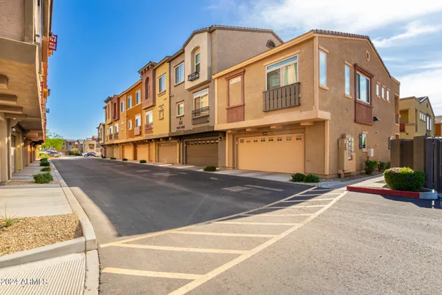 a front view of a building with a street