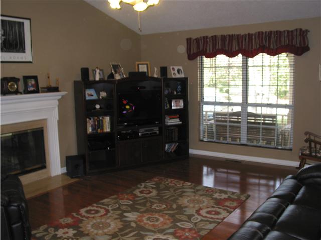 3525 Shakertown Road Antioch, TN 37013 - Photo 10 of 17 Den with fireplace and vaulted ceiling - Large windows makes the den nice and bright