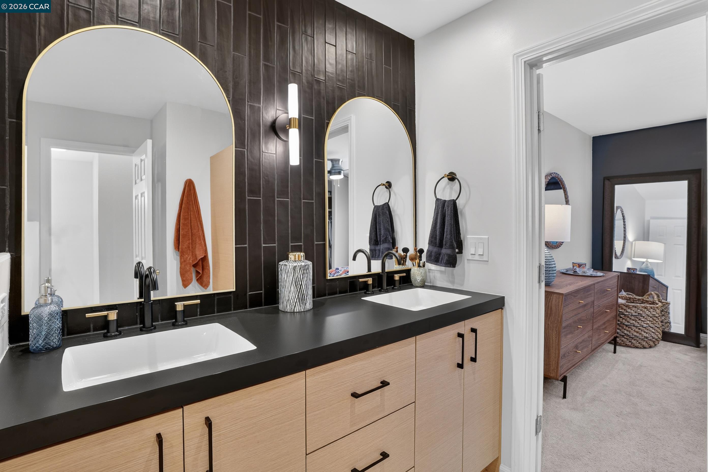 1812 Wildbrook Court, Unit C Concord, CA 94521 - Photo 14 of 35 a en suite bathroom with double vanity sinks and a large mirror