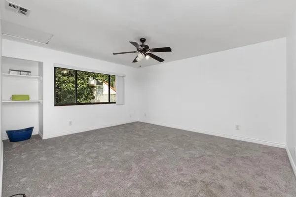 a bathroom with a toilet and a bathtub