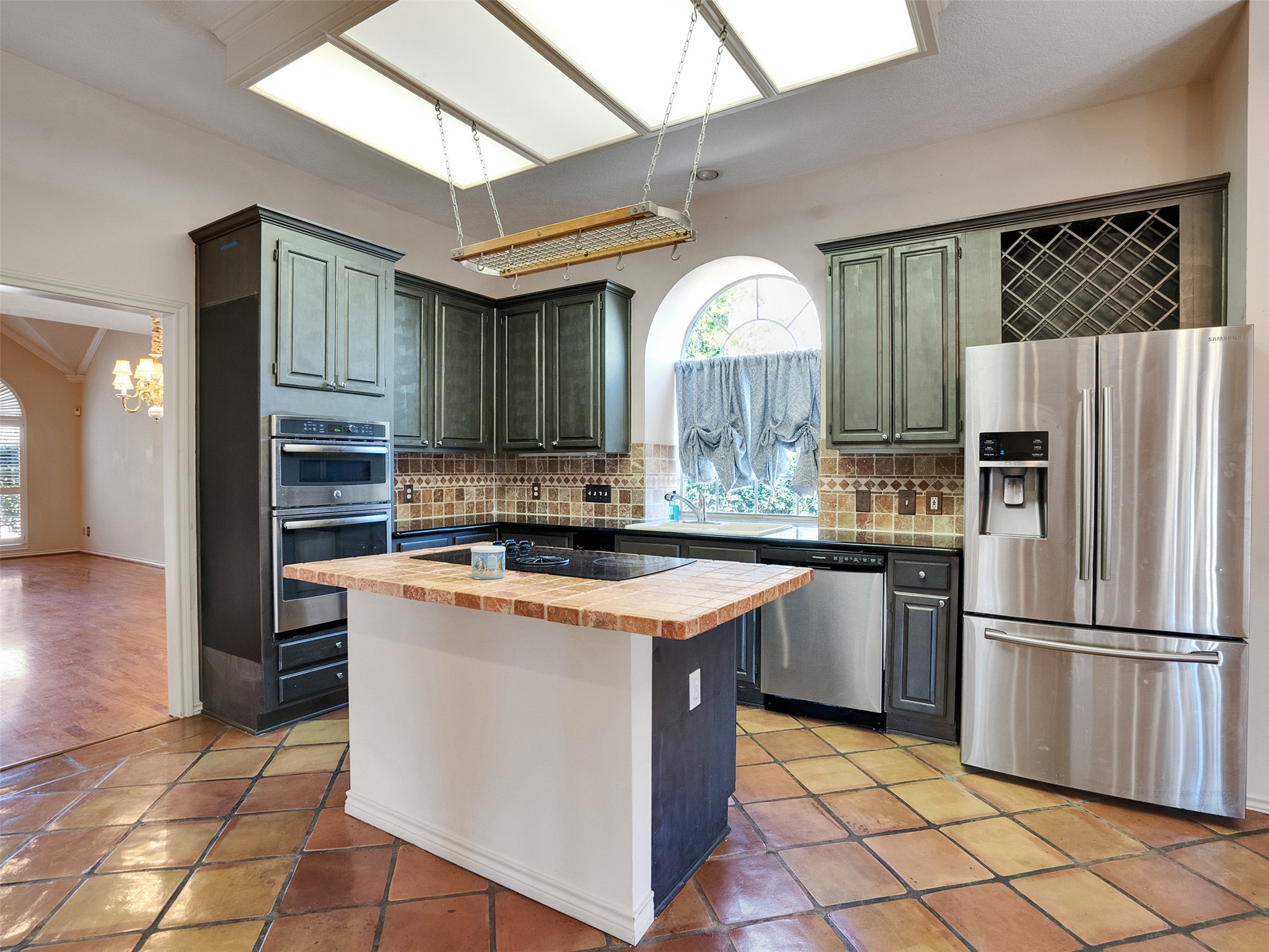 16735 Manningtree Lane Spring, TX 77379 - Photo 21 of 47 Open concept kitchen - Refrigerator included!