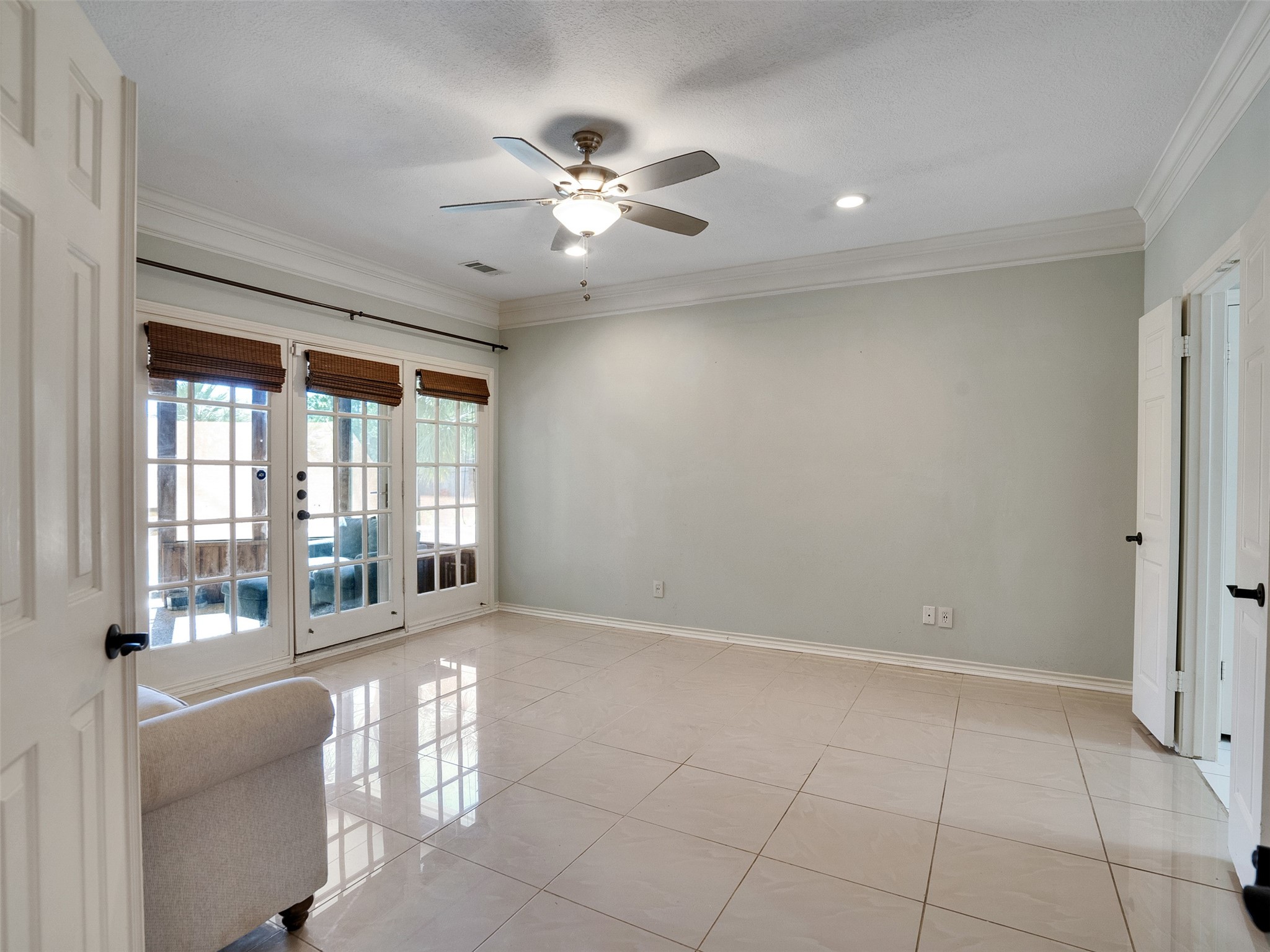 16735 Manningtree Lane Spring, TX 77379 - Photo 27 of 47 Main floor primary bedroom with 5 piece en-suite & walks out to screened in porch over looking yard and private pool