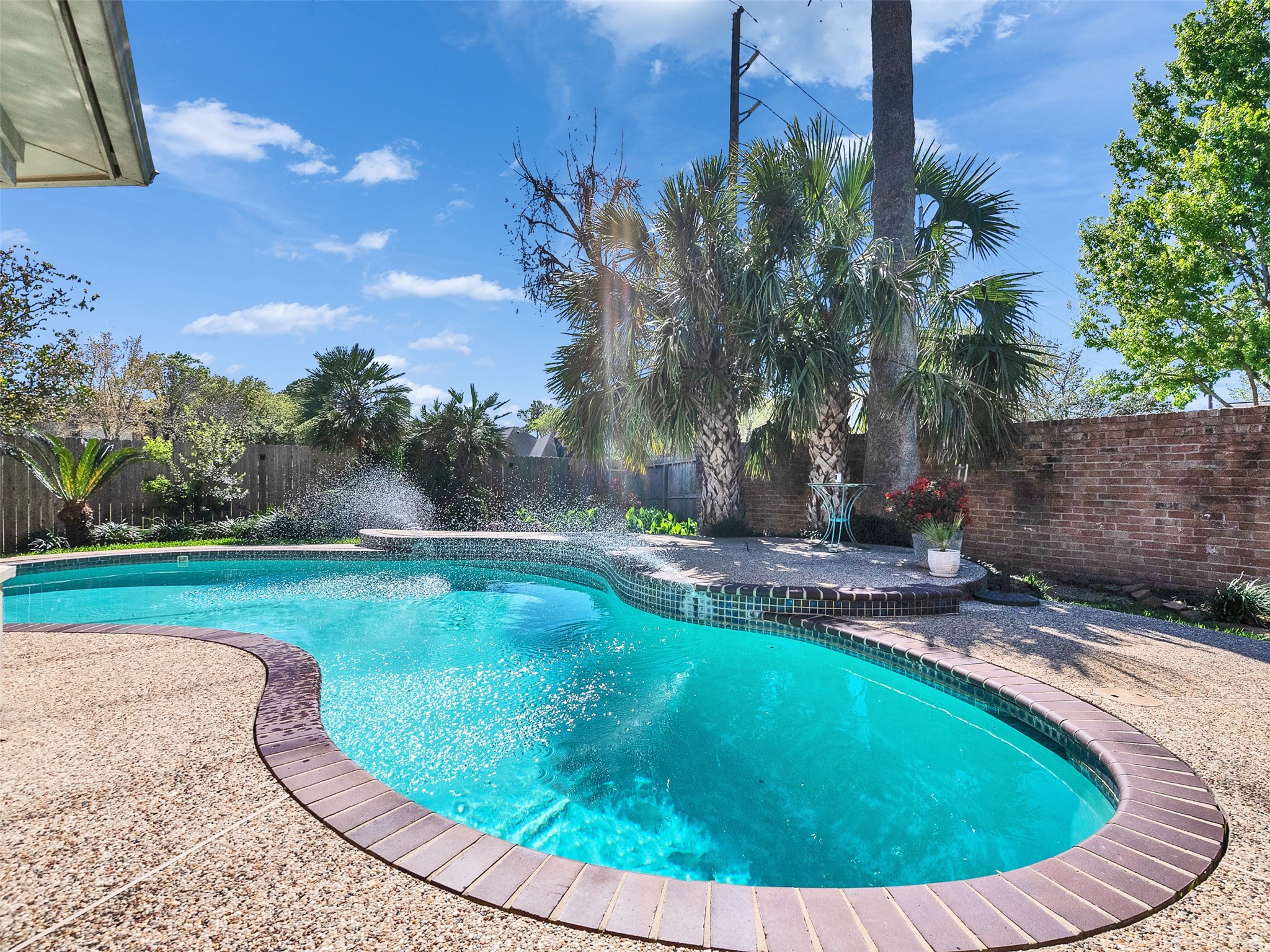 16735 Manningtree Lane Spring, TX 77379 - Photo 7 of 47 Beautiful private pool with fountains that can be controlled to spray or glide out!