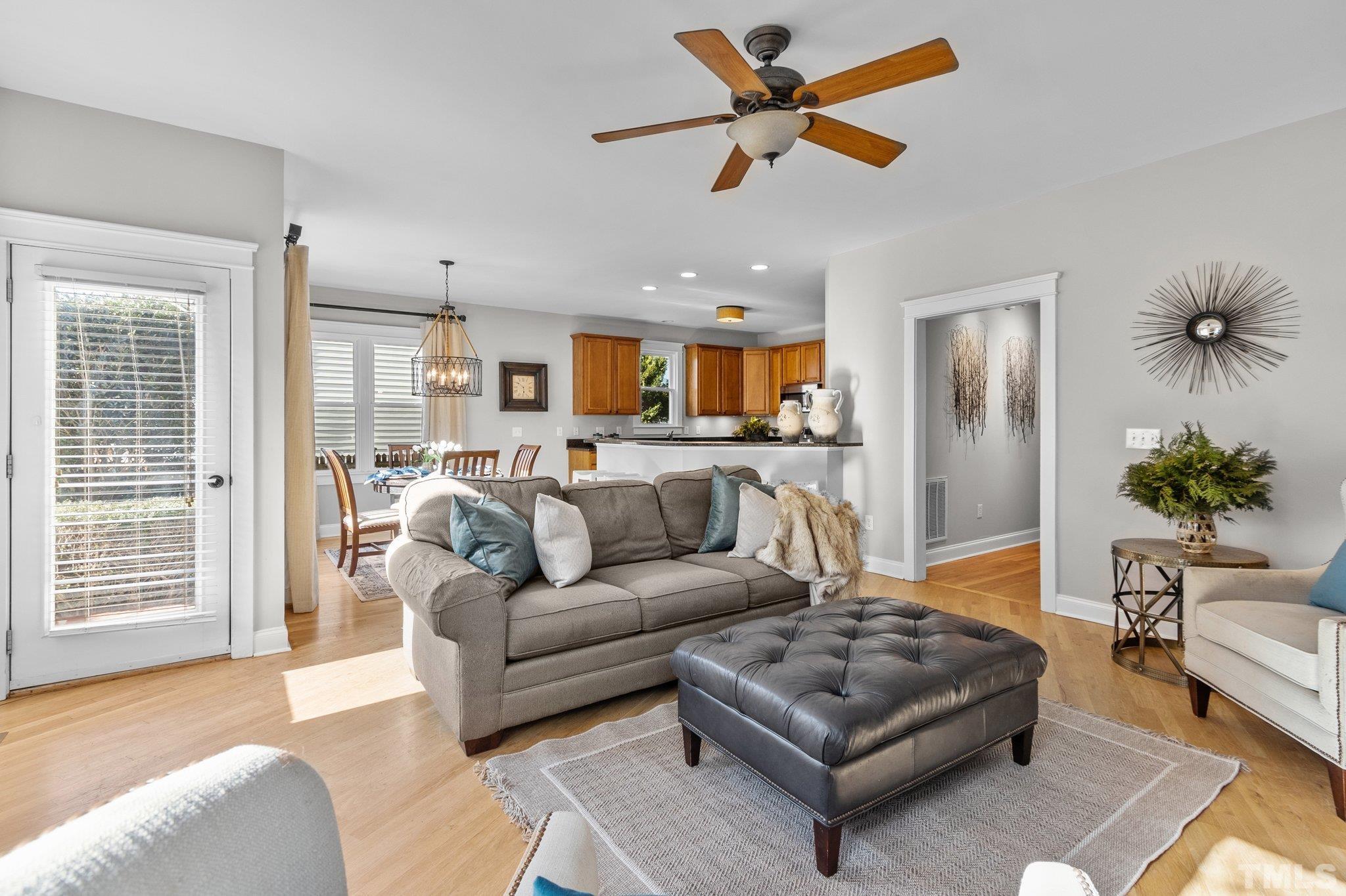 145 Kingsport Road Holly Springs, NC 27540 - Photo 15 of 42 a living room with furniture and a large window