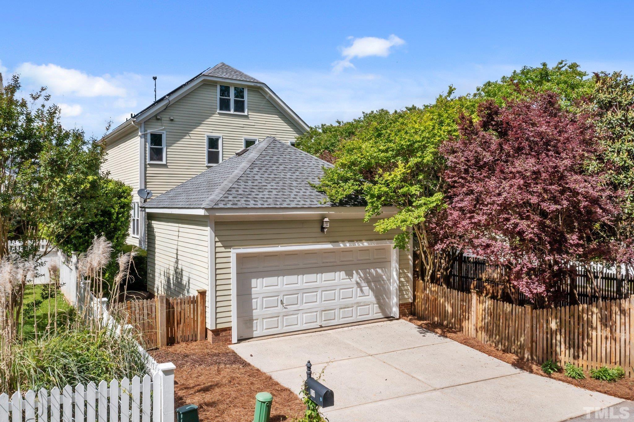 145 Kingsport Road Holly Springs, NC 27540 - Photo 31 of 42 a front view of a house with trees
