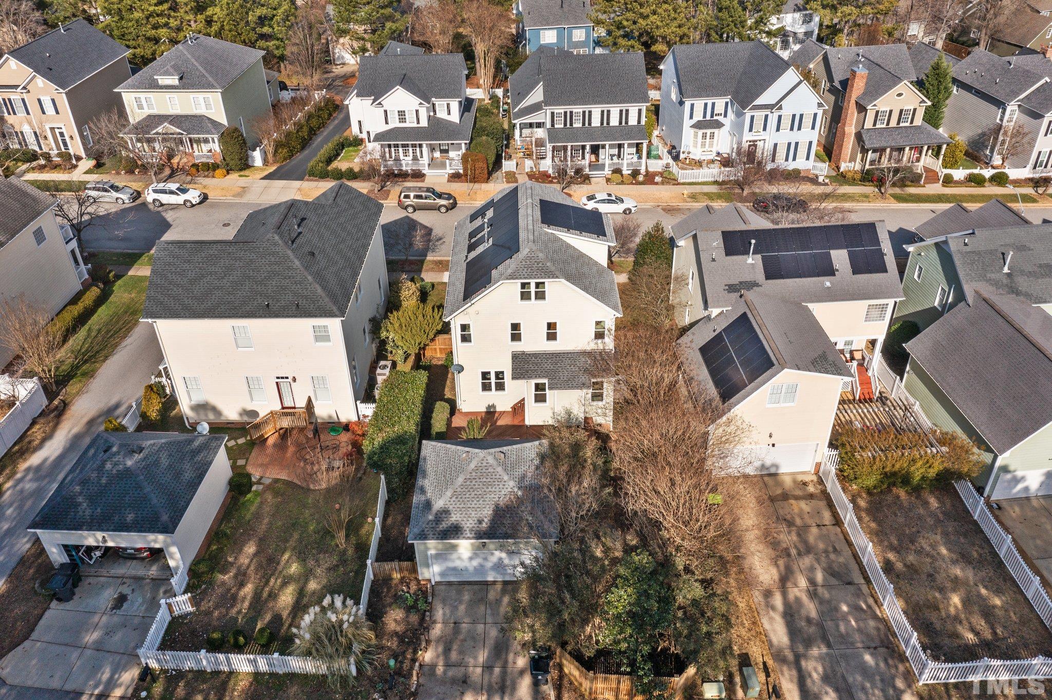 145 Kingsport Road Holly Springs, NC 27540 - Photo 35 of 42 an aerial view of residential houses with outdoor space