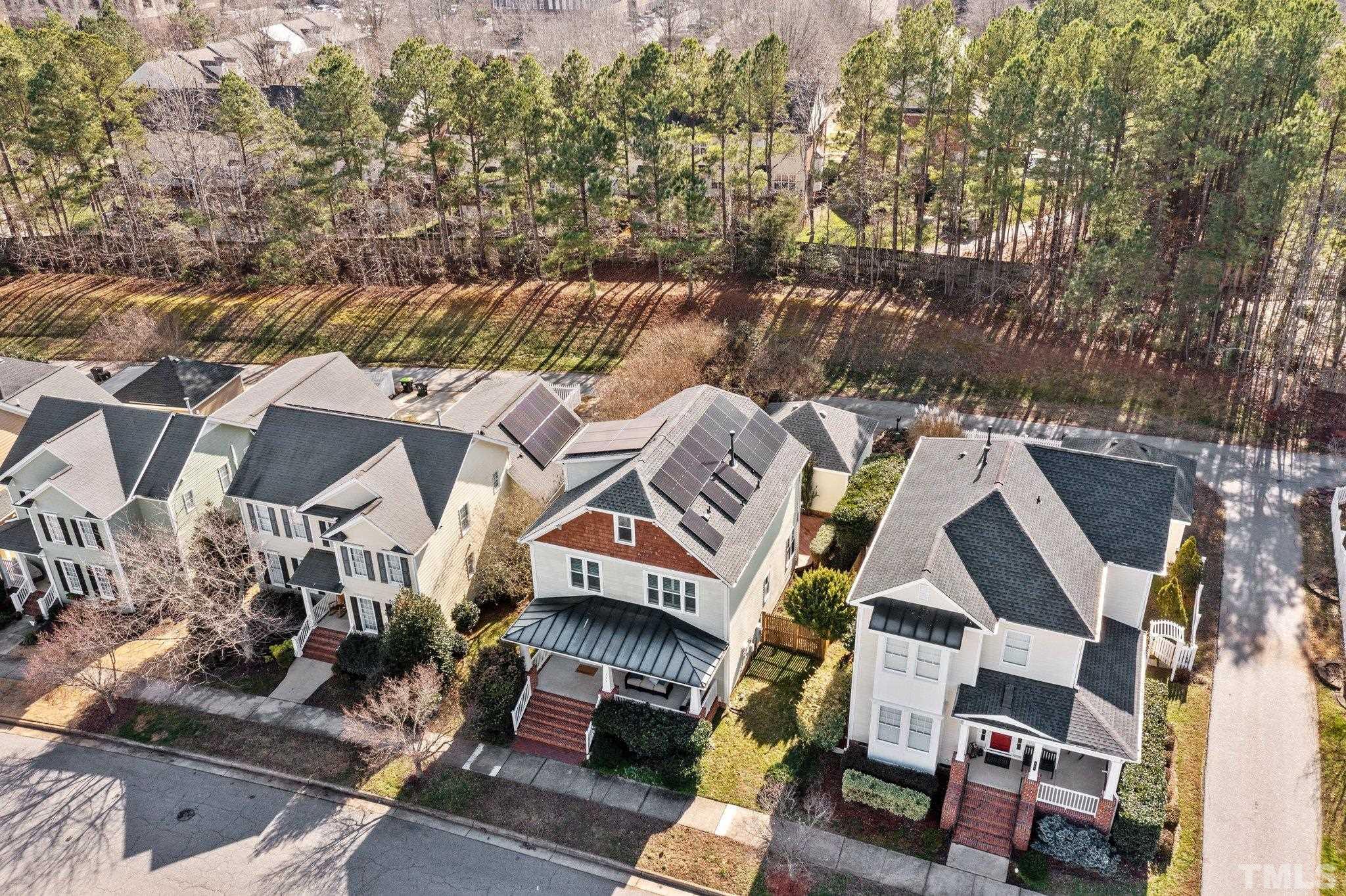 145 Kingsport Road Holly Springs, NC 27540 - Photo 36 of 42 an aerial view of residential houses with outdoor space
