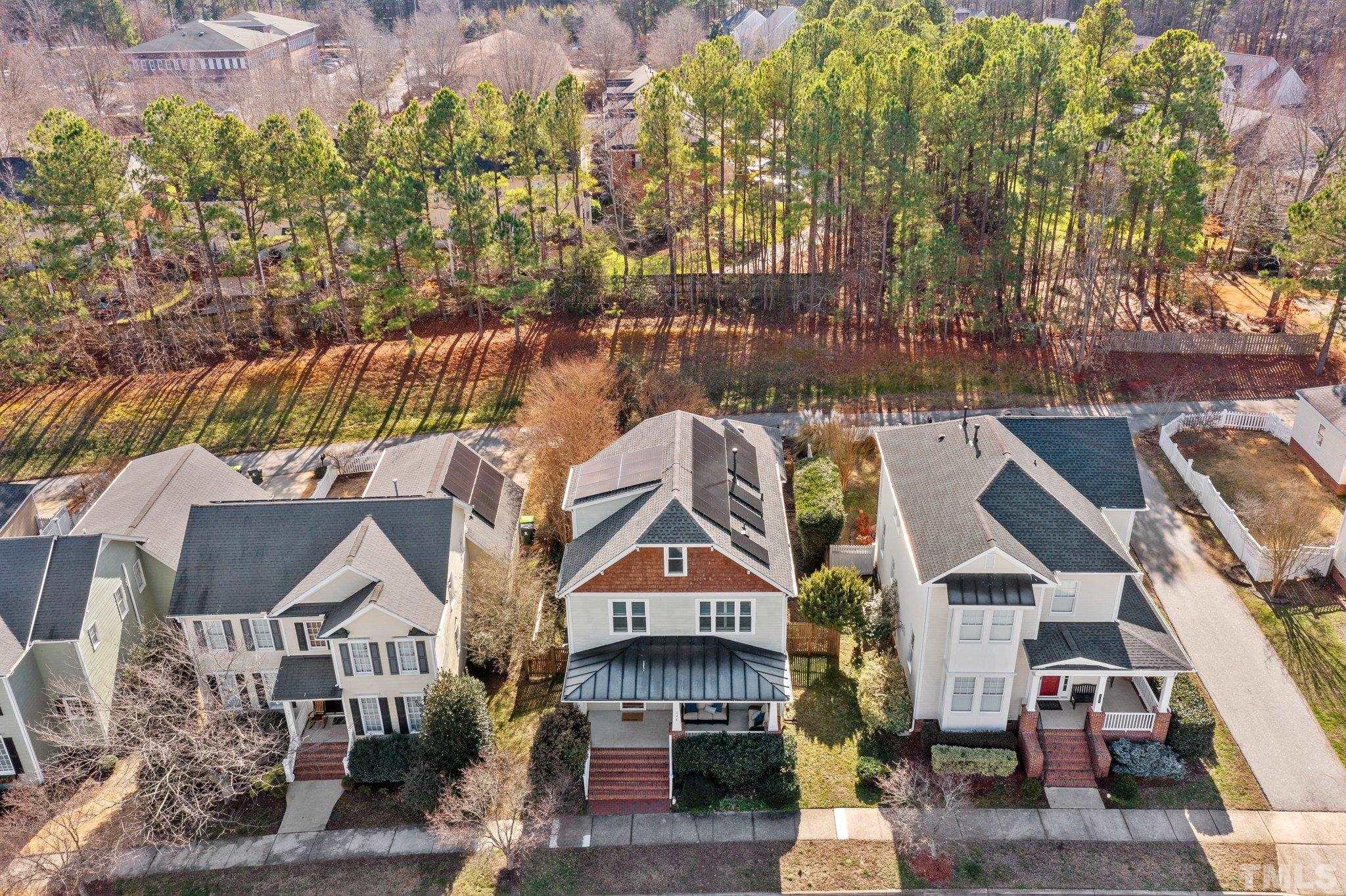 145 Kingsport Road Holly Springs, NC 27540 - Photo 37 of 42 a front view of a house with a garden