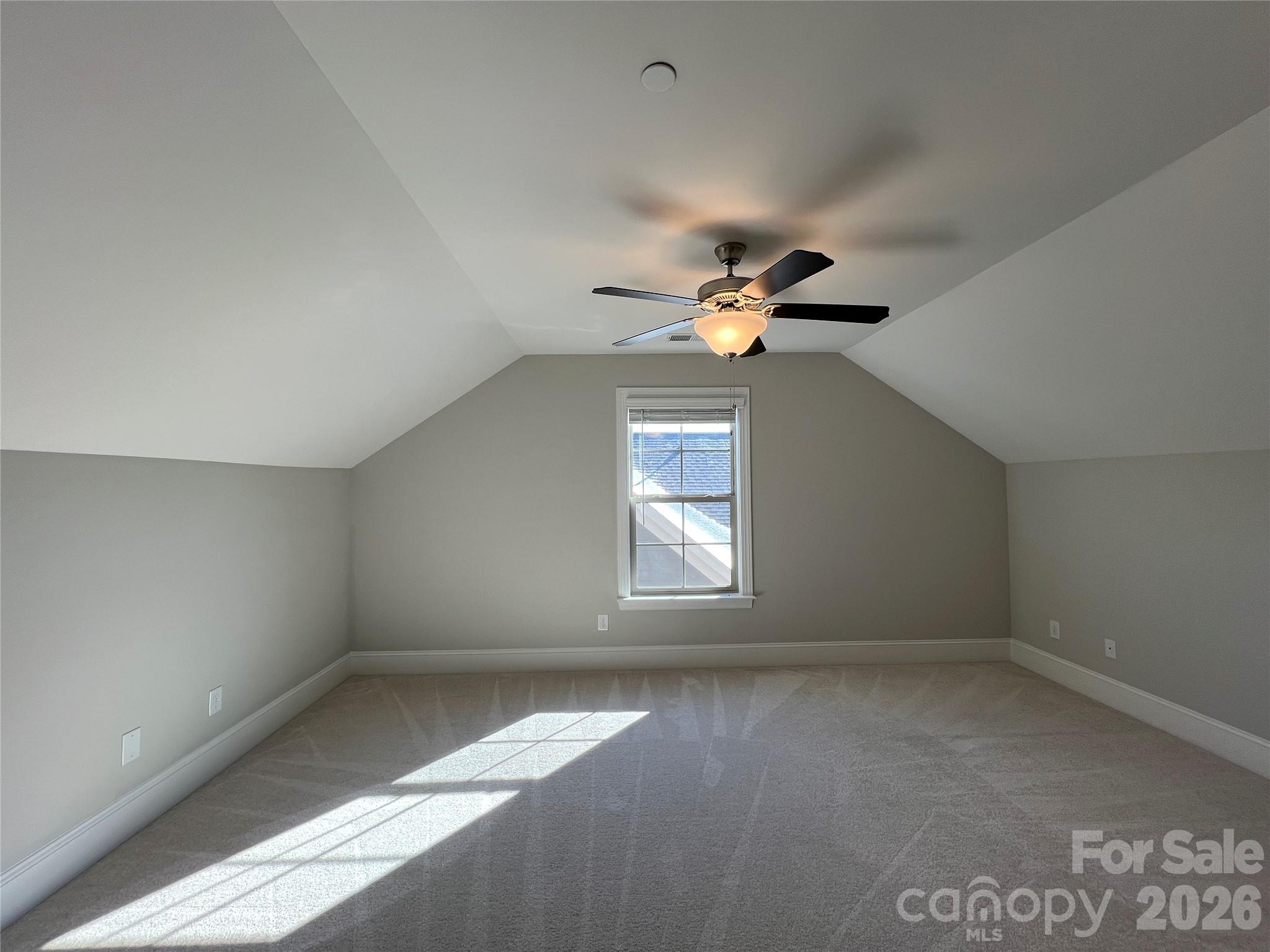 9049 Treetop Way Northwest Concord, NC 28027 - Photo 30 of 42 wooden floor in an empty room with a window