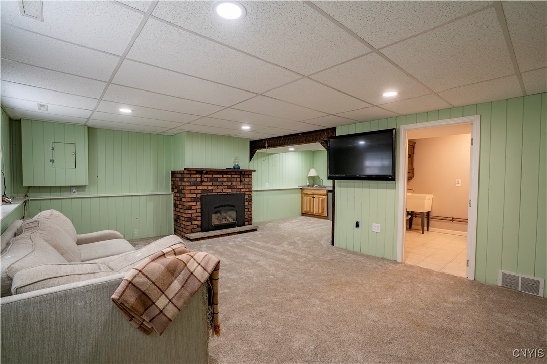 5039 Briarledge Road Syracuse, NY 13212 - Photo 33 of 43 finished lower level with half bath and wet bar