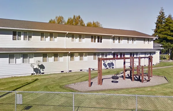 a view of a building with a patio