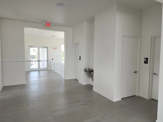 a room with furniture and a window