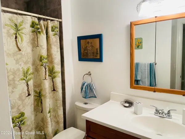 a kitchen with stainless steel appliances a stove a sink and a refrigerator