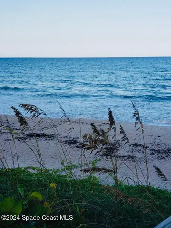 a view of beach and ocean