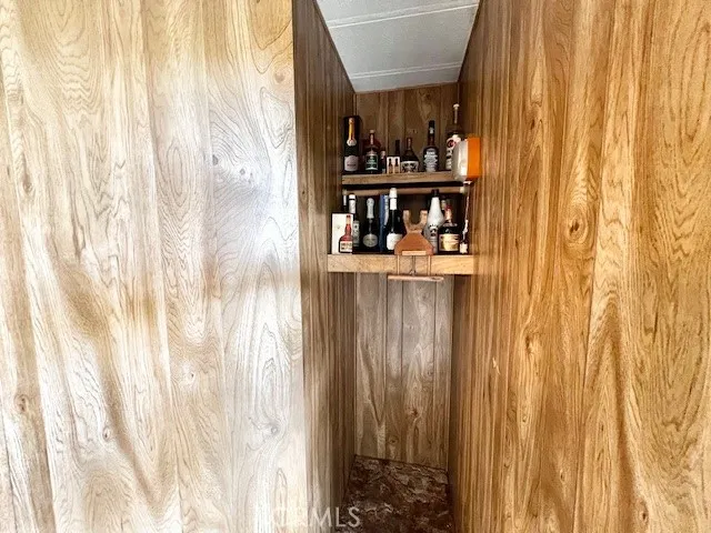 a view of a living room and bathroom