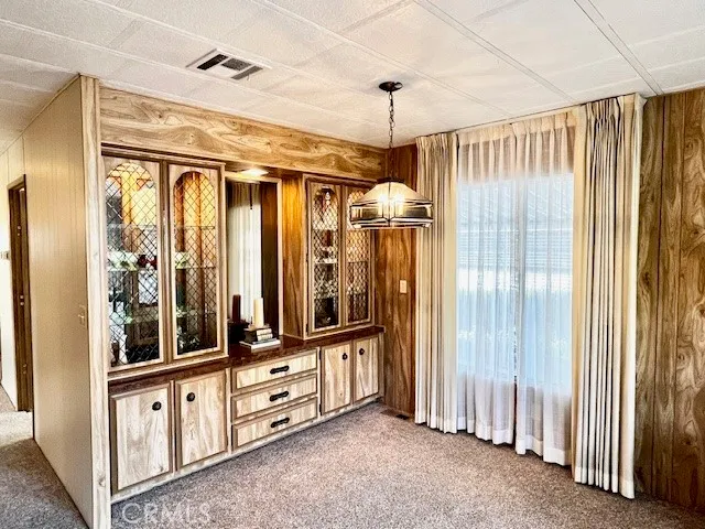 a view of a bathroom with tub and shower