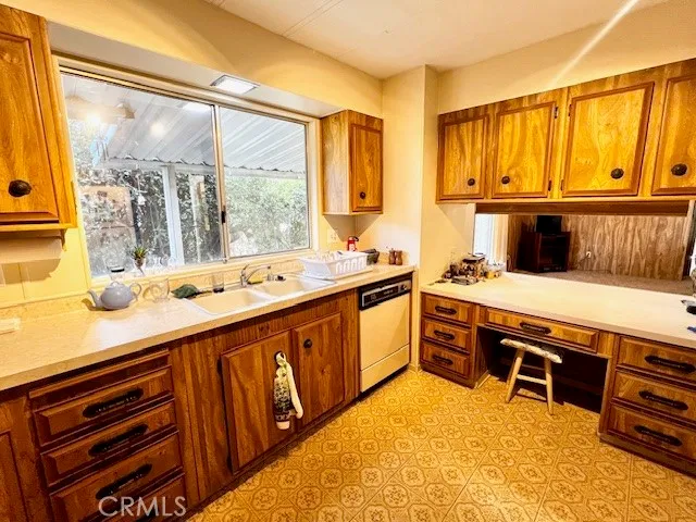 a room with wooden floor and furniture