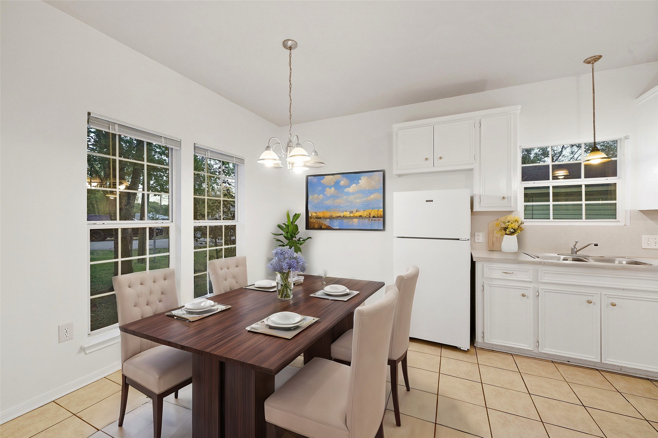 5502 Finch Street, Unit B Houston, TX 77028 - Photo 16 of 37 a view of a dining room with furniture window and wooden floor