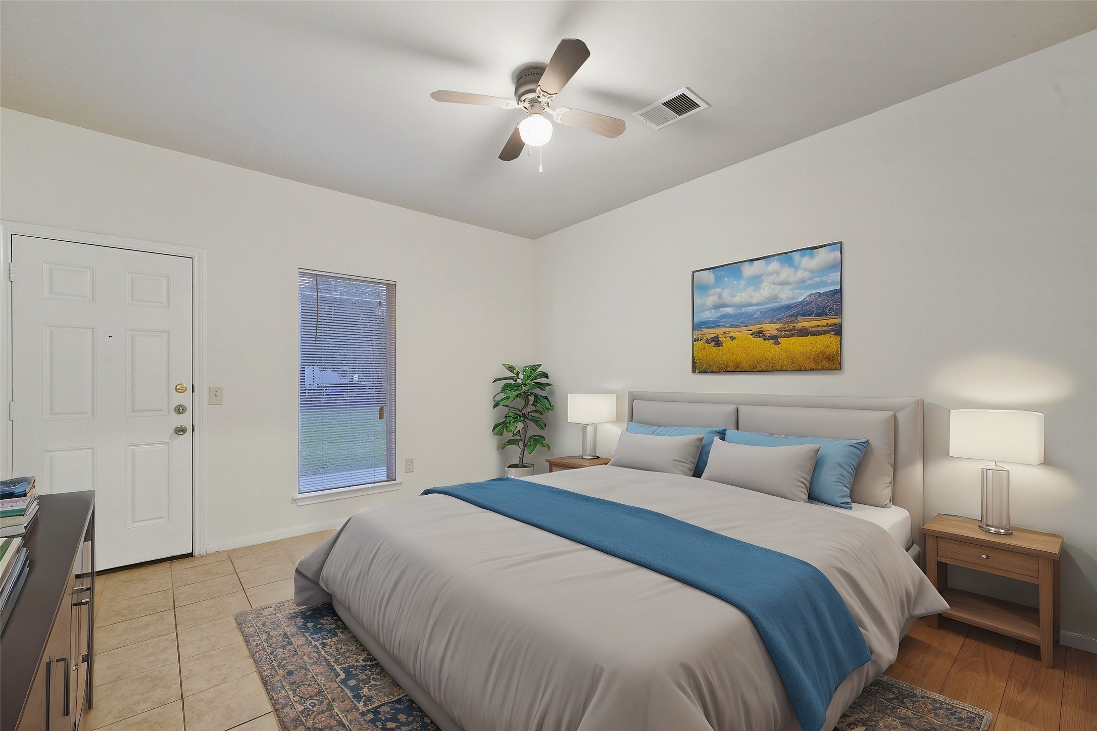 5502 Finch Street, Unit B Houston, TX 77028 - Photo 23 of 37 a bedroom with a bed and a chandelier