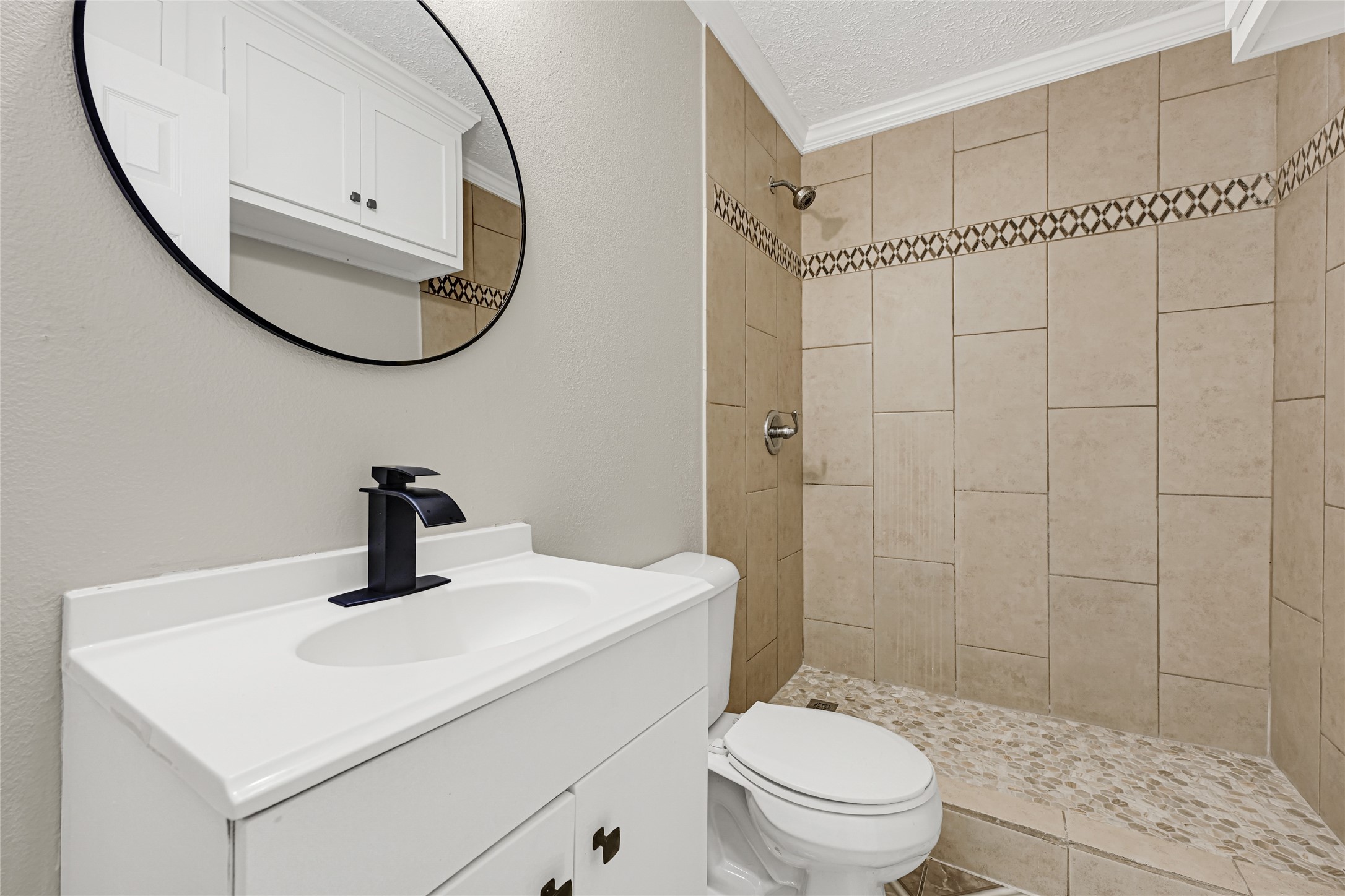 2207 Raymond Street Pasadena, TX 77506 - Photo 14 of 21 a bathroom with a sink a toilet and a mirror