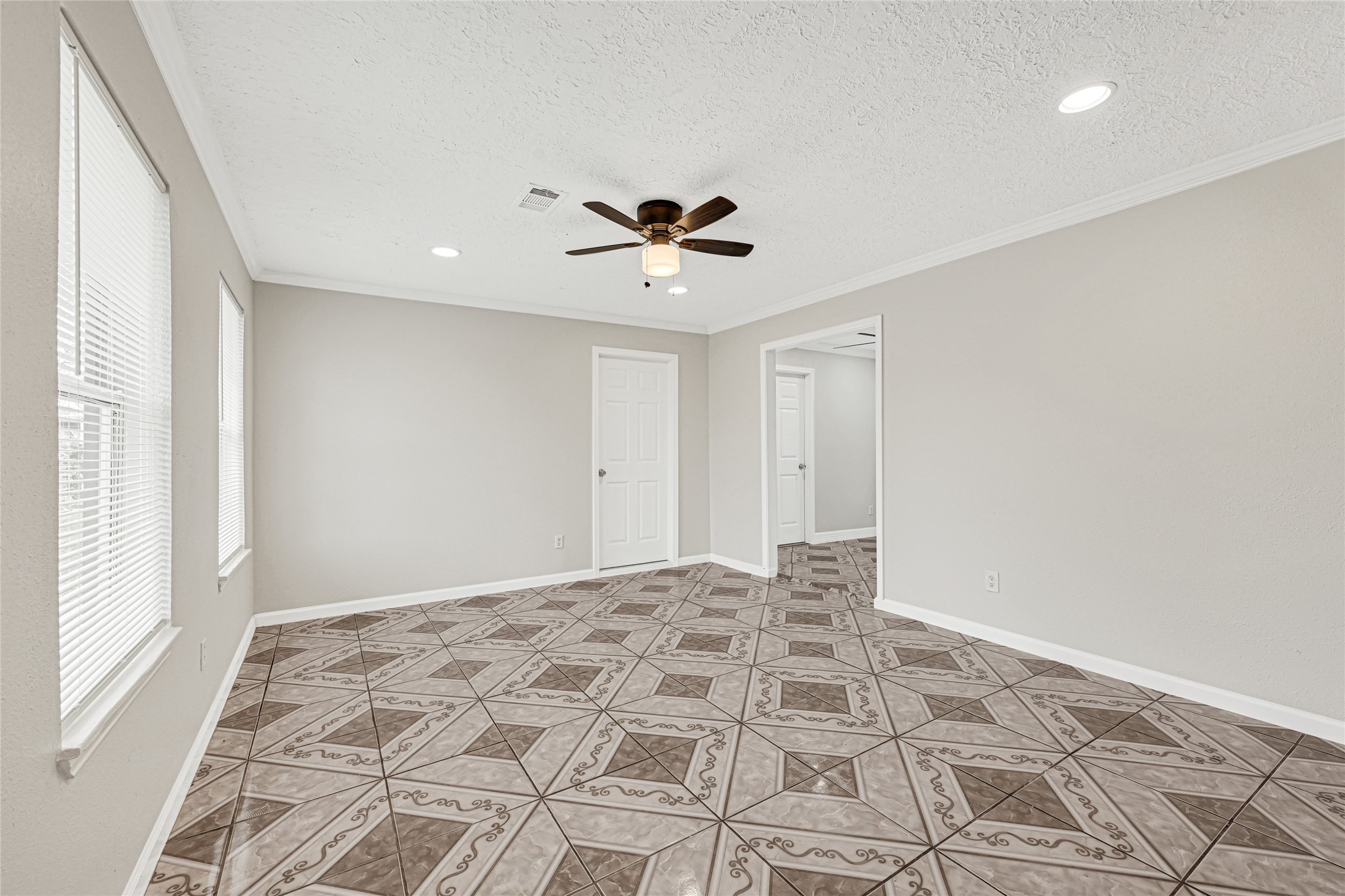 2207 Raymond Street Pasadena, TX 77506 - Photo 4 of 21 a view of a livingroom with a chandelier fan