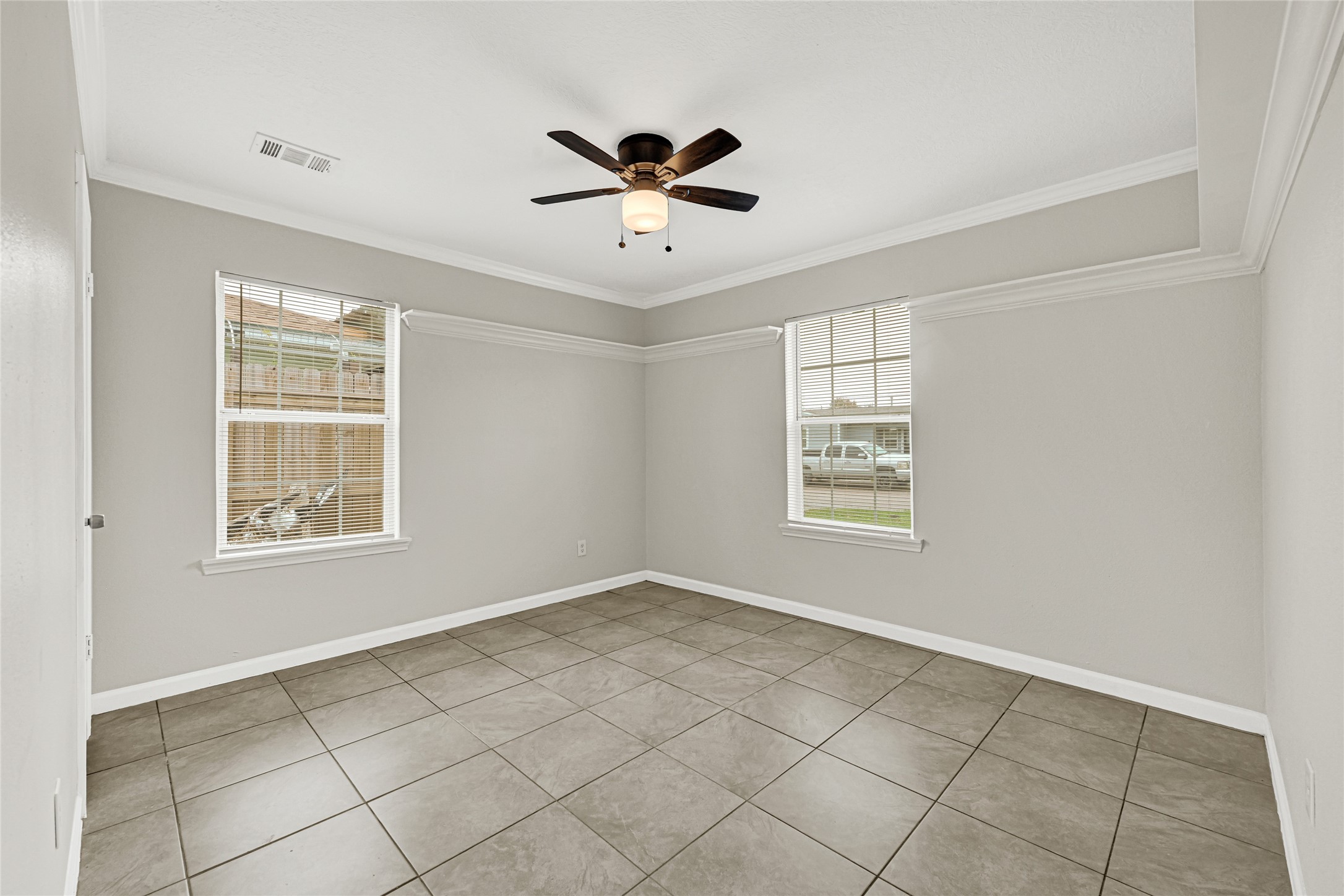 2207 Raymond Street Pasadena, TX 77506 - Photo 10 of 21 a view of an empty room with a window