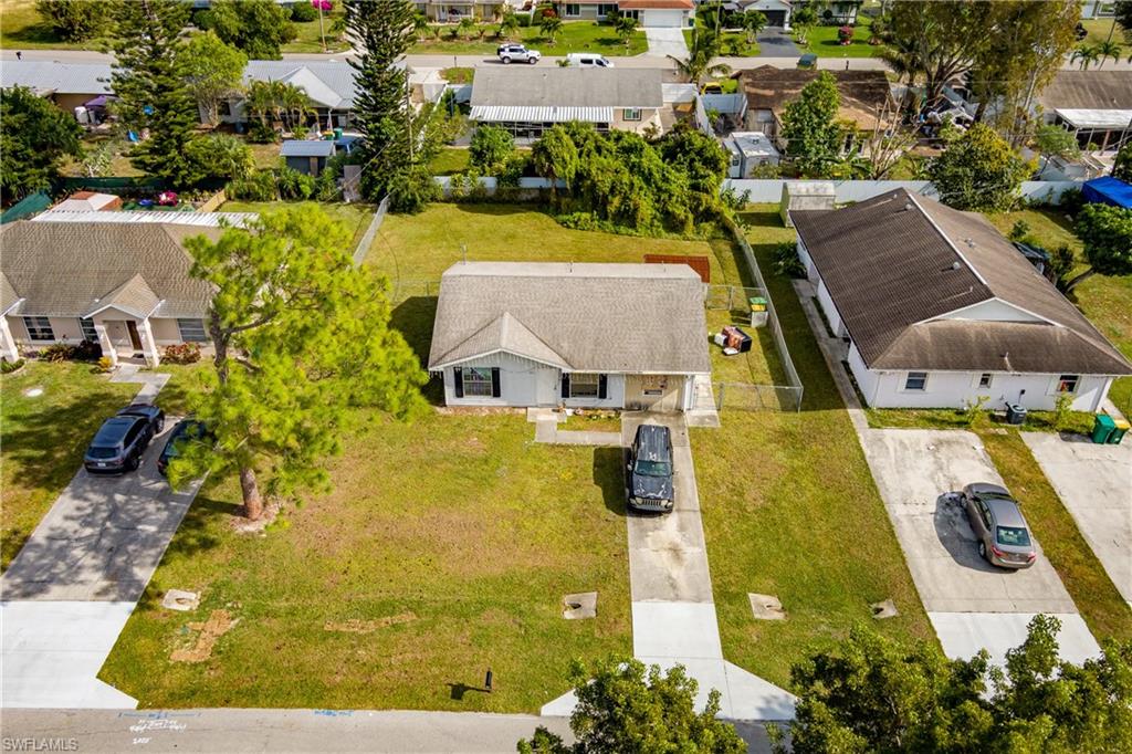 2100 55th Terrace Southwest Naples, FL 34116 - Photo 14 of 33 an aerial view of residential house with outdoor space and swimming pool