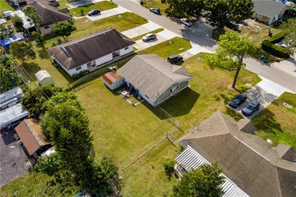 2100 55th Terrace Southwest Naples, FL 34116 - Photo 20 of 33 an aerial view of residential house with swimming pool