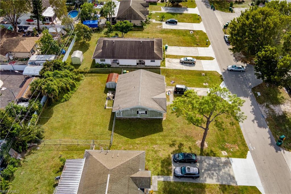 2100 55th Terrace Southwest Naples, FL 34116 - Photo 21 of 33 an aerial view of residential houses with outdoor space
