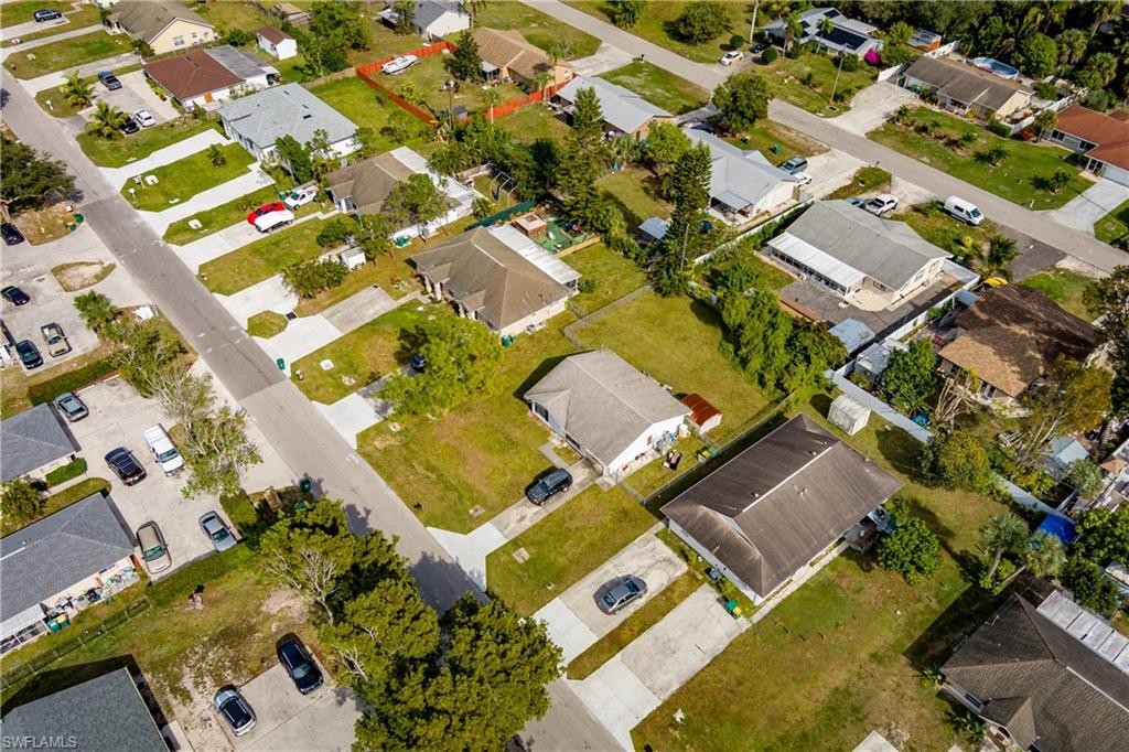 2100 55th Terrace Southwest Naples, FL 34116 - Photo 24 of 33 an aerial view of residential house with parking