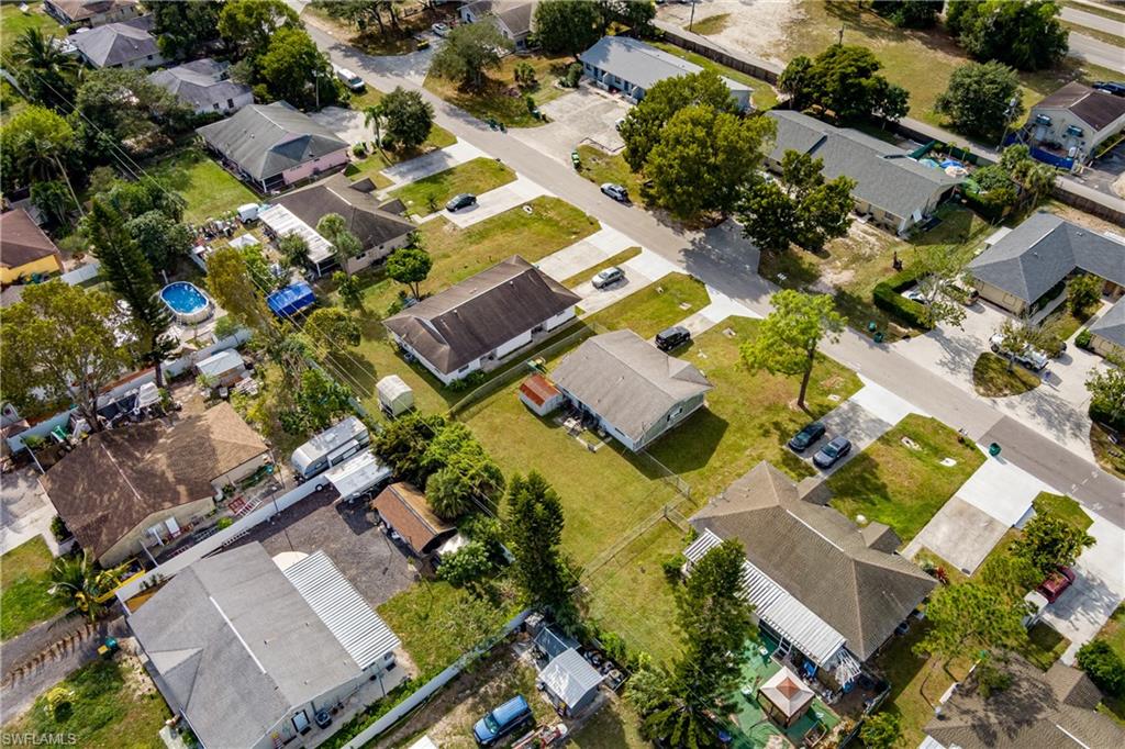2100 55th Terrace Southwest Naples, FL 34116 - Photo 26 of 33 an aerial view of residential house with outdoor space