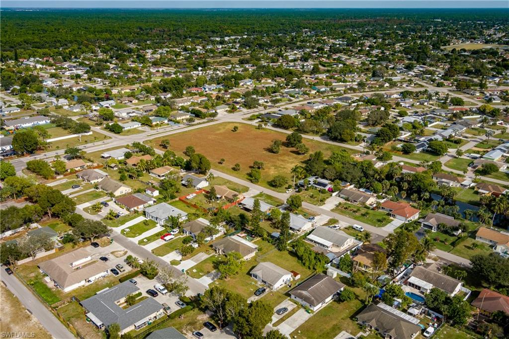 2100 55th Terrace Southwest Naples, FL 34116 - Photo 30 of 33 an aerial view of residential houses with outdoor space