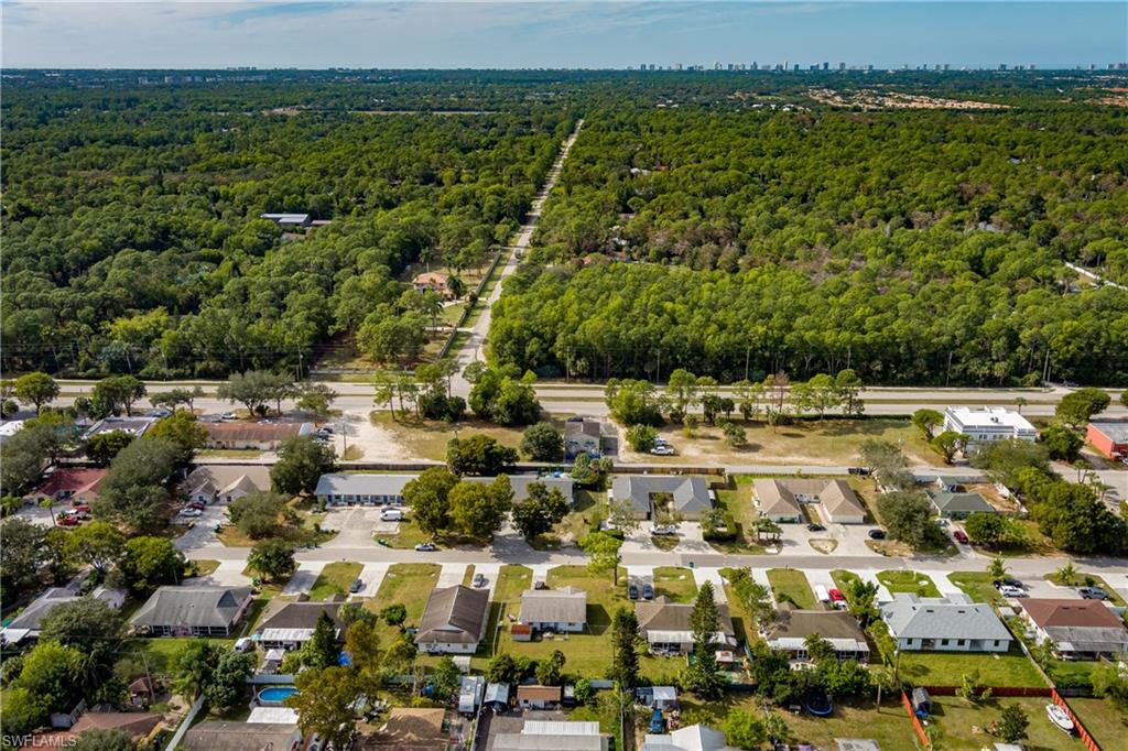 2100 55th Terrace Southwest Naples, FL 34116 - Photo 32 of 33 a picture of city view with ocean