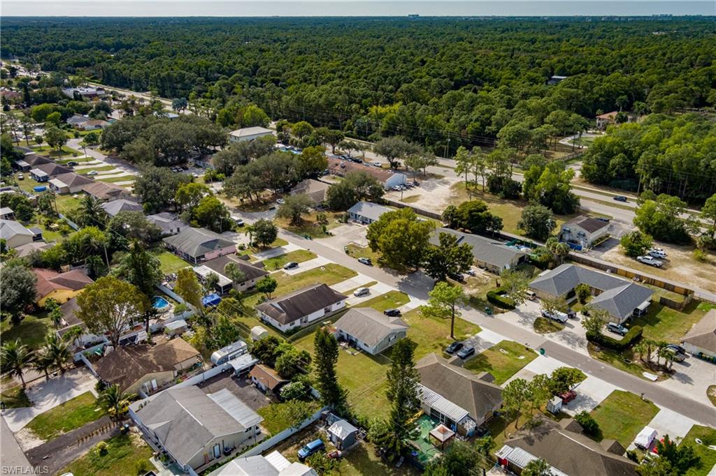 2100 55th Terrace Southwest Naples, FL 34116 - Photo 33 of 33 an aerial view of residential houses with outdoor space
