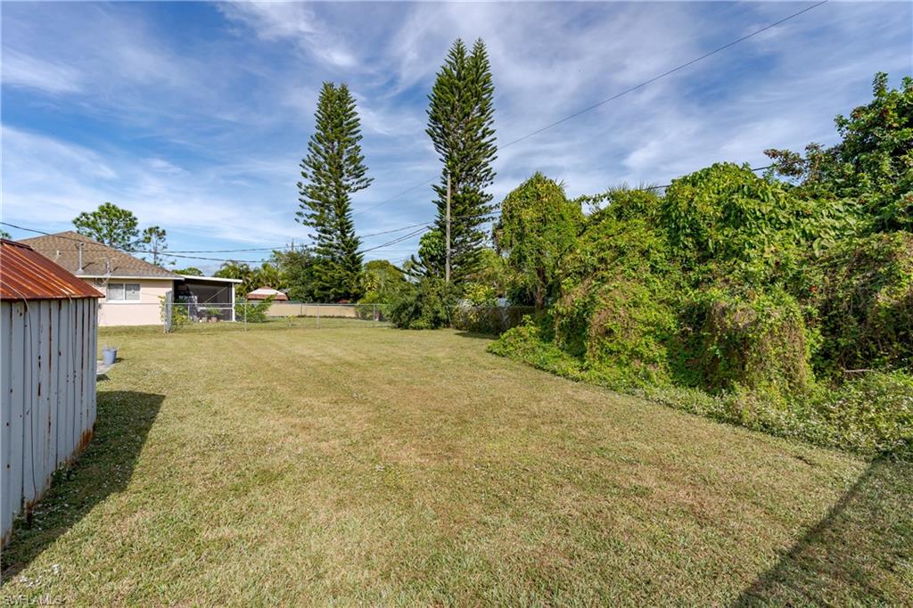 2100 55th Terrace Southwest Naples, FL 34116 - Photo 9 of 33 a view of a yard with plants