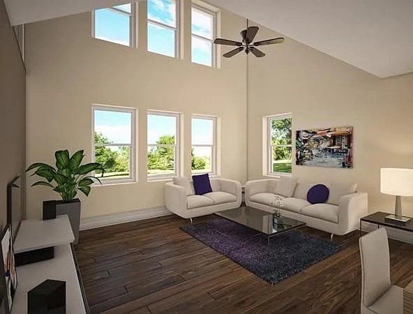 60 Howard Street, Unit 415 Watertown, MA 02472 - Photo 2 of 5 a living room with furniture potted plant and a window