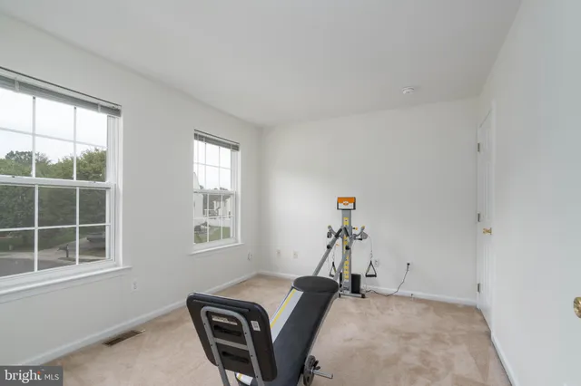 a room with furniture and a window