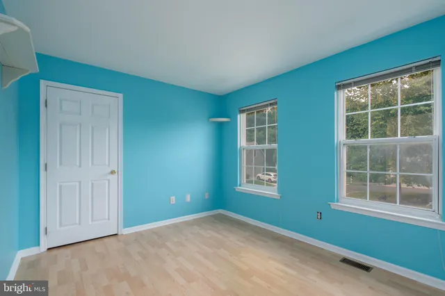 an empty room with windows