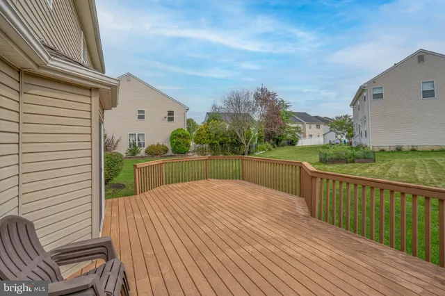 a view of balcony with yard