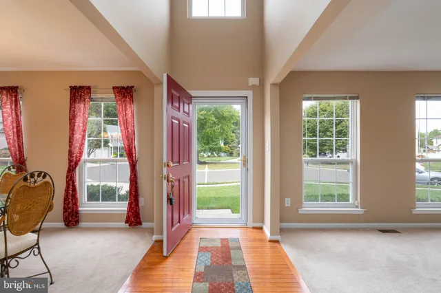 a view of livingroom with furniture and window